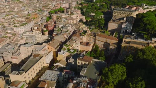 Forwards Fly Above Old Buildings and Landmarks in Historic City Centre on Sunny Morning