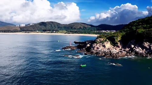 Aerial Top view of a transparent blue sea with beautiful waves at sunny day in summer. air of ocean