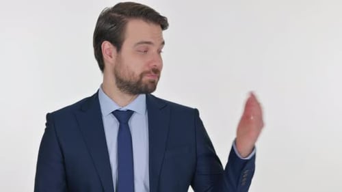 Businessman Presenting to Camera