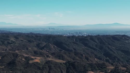 Drone Wide Footage Over Hills and Mountains and View of Los Angeles From Santa Barbara County