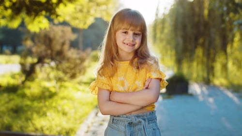 Portrait of Happy Preteen Child Girl Face Smiling Looking at Camera Good Mood Satisfied on Park