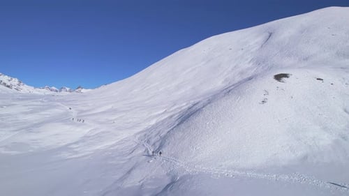 Aerial Birds Eye View Group of Hikers Together on Trek to Tilicho Lake in High Himalayas Mountains