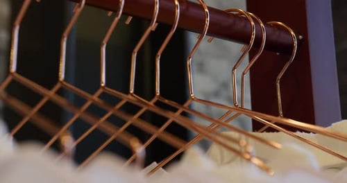 Elegant Copper Clothes Hangers in Modern Boutique
