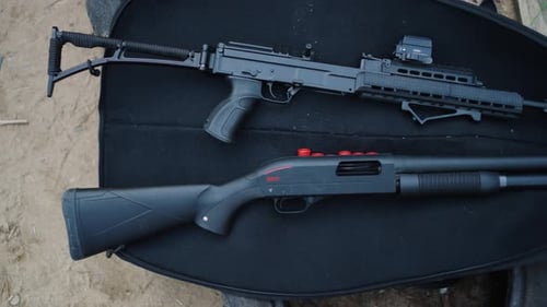 Black Rifle and Shotgun in Carrying Case