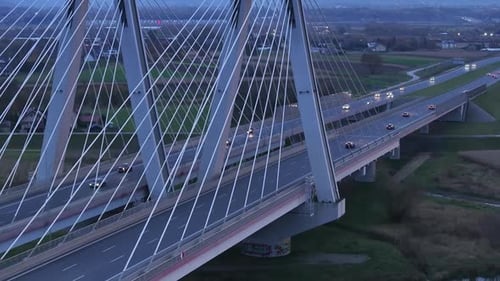 Aerial View Traffic Moving on the Bridge at Dusk in the City of Krakow in Poland Closeup of a Modern