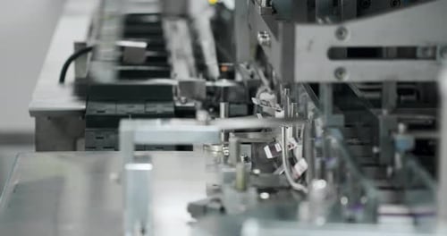 Close Up of Manufacturing Line at Medical Factory Packaging of Drug