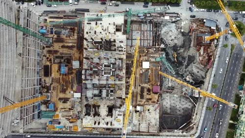 Aerial View the Building Construction. Aerial View Of City Development. Skyscraper Building Process