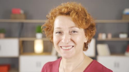 Smiling Woman Close-up Portrait with Red Hair