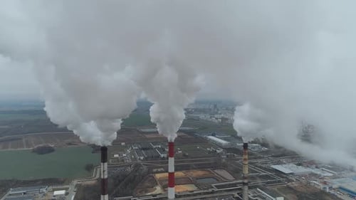 Thermal Power Energy Station View From Height to Pipes in Fog Steam and Smoke From Pipes