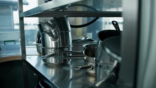 Professional commercial empty clean modern kitchen in restaurant or cafe Metal kitchen equipment