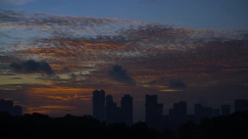Sunrise Over the City Skyline at Dawn