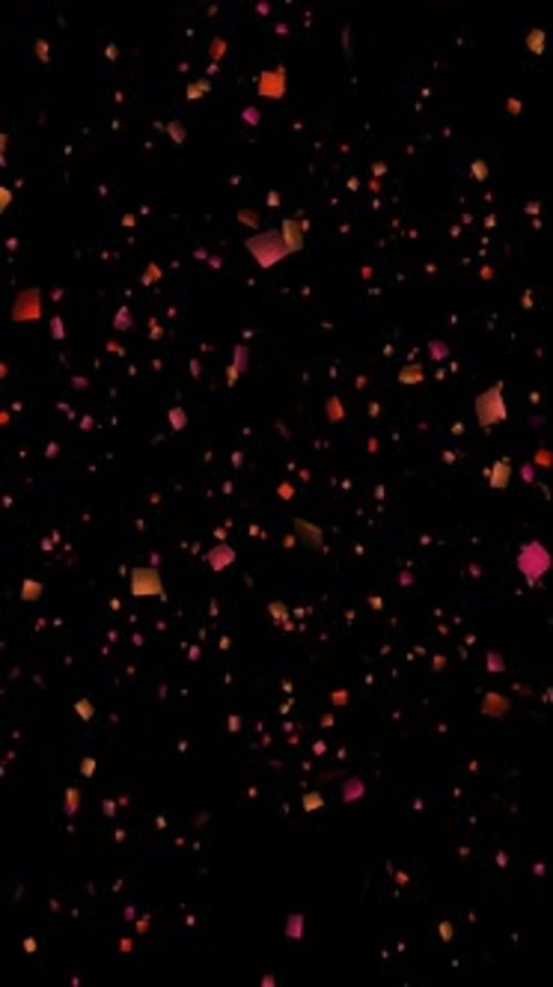 Colored Confetti Falling Down On Black Background