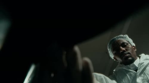 Forensic Scientists Examining Evidence at Crime Scene