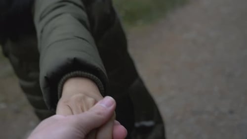 Holding hands, Girl takes cameraman for a walk