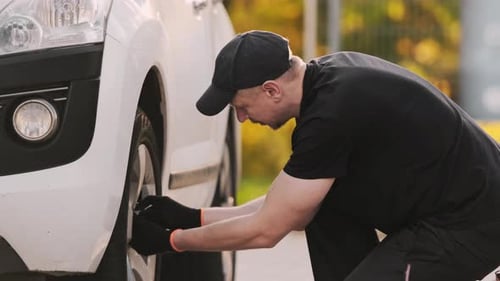 Mechanic Fixes Car