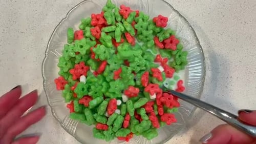Cereal in a bowl of milk. Festive Christmas colors for the winter Holidays.