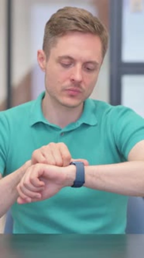 Man Using Smart Watch Indoors, Technology Theme