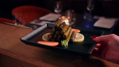 Delicious Stuffed Grape Leaves with Lemon at Restaurant