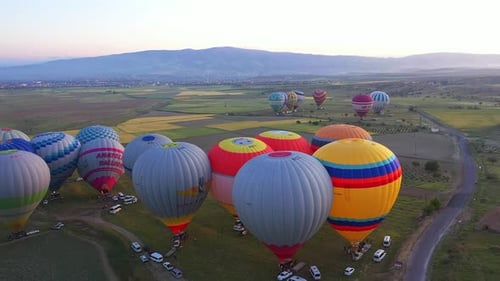 Aerial View of Hundreds of Hot Air Balloons in the Sky