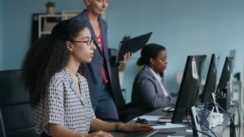 Operator Coming up to Desk, Sitting down, Putting on Headset and Networking