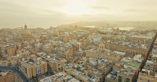 Breathtaking Aerial View of Valletta Malta at Sunset Showcasing the Cityscape