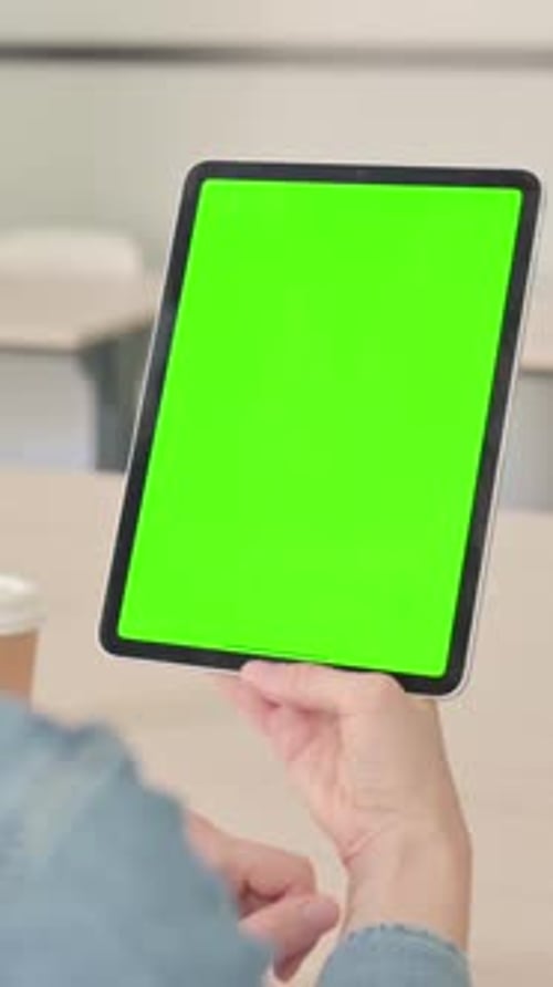 Rear View of Young Woman using Tablet with Chroma Key, Vertical Video