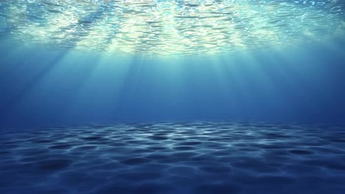 Underwater scene with ocean waves flowing in deep blue water