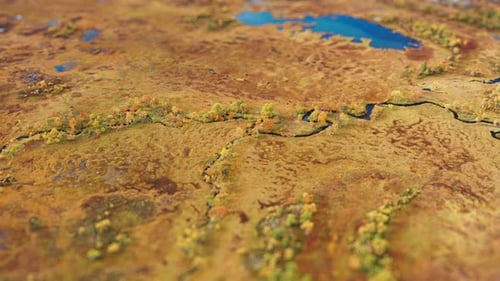 Meandering streams and small lakes in the marshy landscape of the Norwegian tundra. Aerial view, til