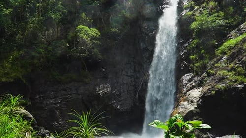 Ascending view of Ta Gu waterfall embedded in the rocks inside the Vietnamese jungle. Vietnam