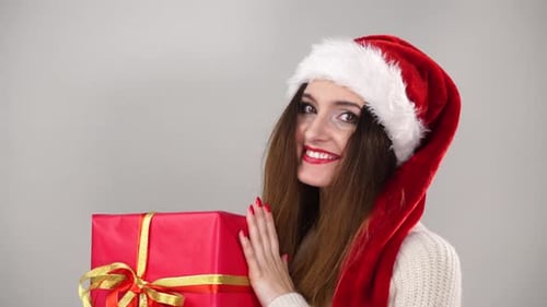 Woman Holding Gift Box For Christmas