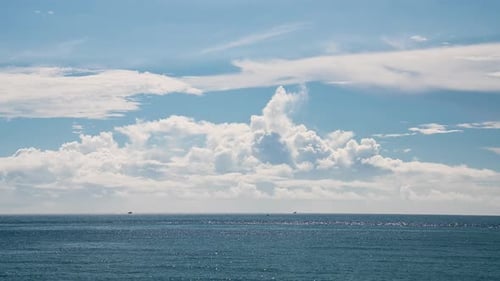 Blue sea, blue sky and ever-changing white clouds. It is very relaxing.
