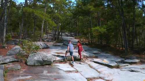 Aerial Drone: Hiking Mountain Forest, Young Athletic Couple,