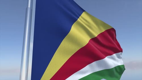 Realistic Seychelles Flag Waving on Flagpole with Blue Sky