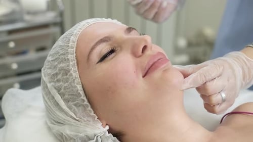 Woman Getting Cosmetic Medical Treatment on Face