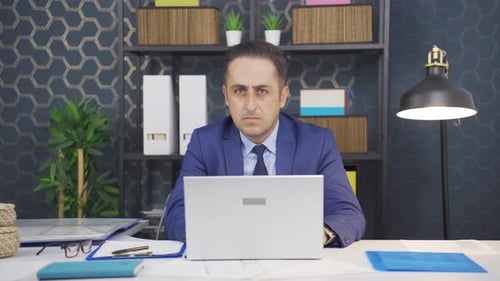 Professional Man in Suit Puts Hand Up to Stop