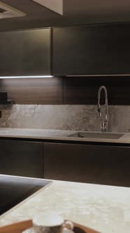 Vertical Video Modern Minimalist Kitchen with White Marble Island and LED Lighting Stylish