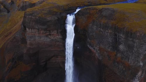 Aerial View of Haifoss Waterfall Dropping Into a Basalt Canyon Iceland