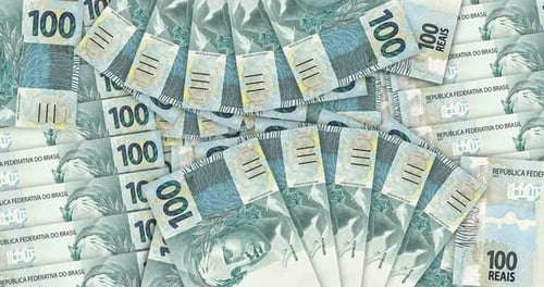 Brazilian Real banknotes in a fan mosaic pattern loop