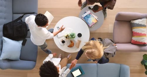 Business people, team handshake and meeting above with technology in creative brainstorming