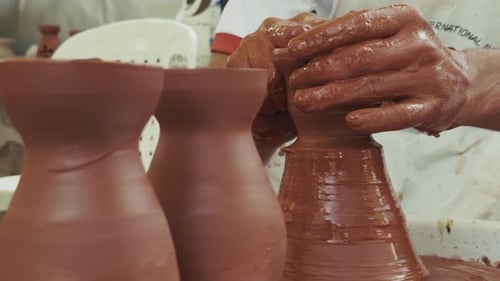 Shaping A Clay Pot In A Ceramics Workshop 13