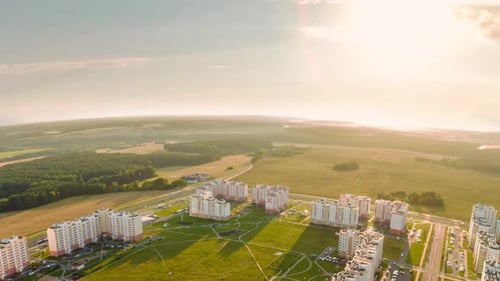 Aerial View of Urban to Rural Landscape at Sunrise