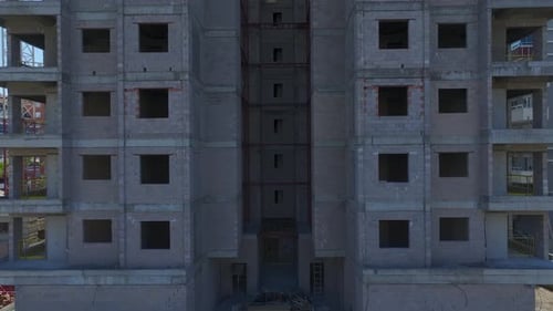 Aerial Video of Tall Concrete Frame Structure By the Sea