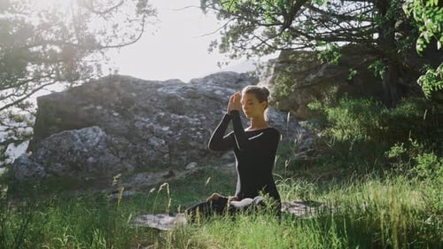 Woman Practice on Meadow in Forest