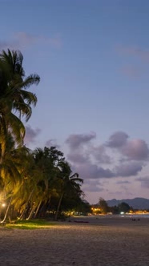 Vertical time lapse video of a tropical beach in Thailand in an evening.