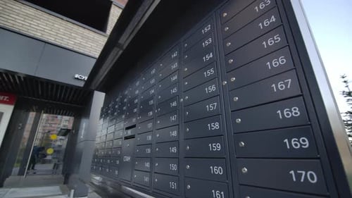 Mailboxes at a Modern Apartment Building Entrance