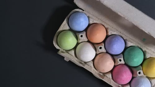 Pastel Chalk Eggs in Egg Carton, High Angle