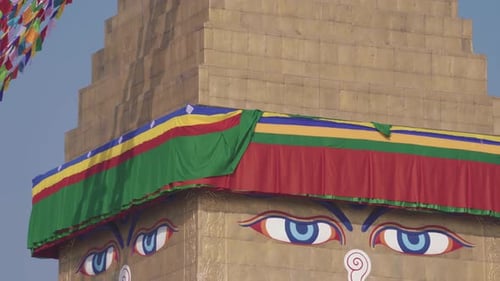 Eyes Of The Buddha On The Boudhanath Stupa. UNESCO World Heritage Site In Kathmandu, Nepal - panning