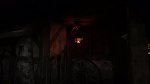 Rural Barn Interior Revealing Daybreak with Lantern Glow