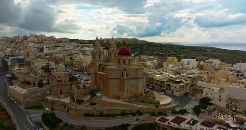 Aerial View of the Mellieha Church with Red Dome and the Sea in the Background Mellieha Malta