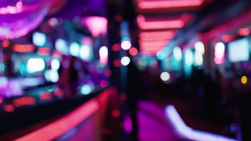 Experience the Vibrant Neon Lights That Fill the Air with Life in a Stylish Modern Lounge Atmosphere